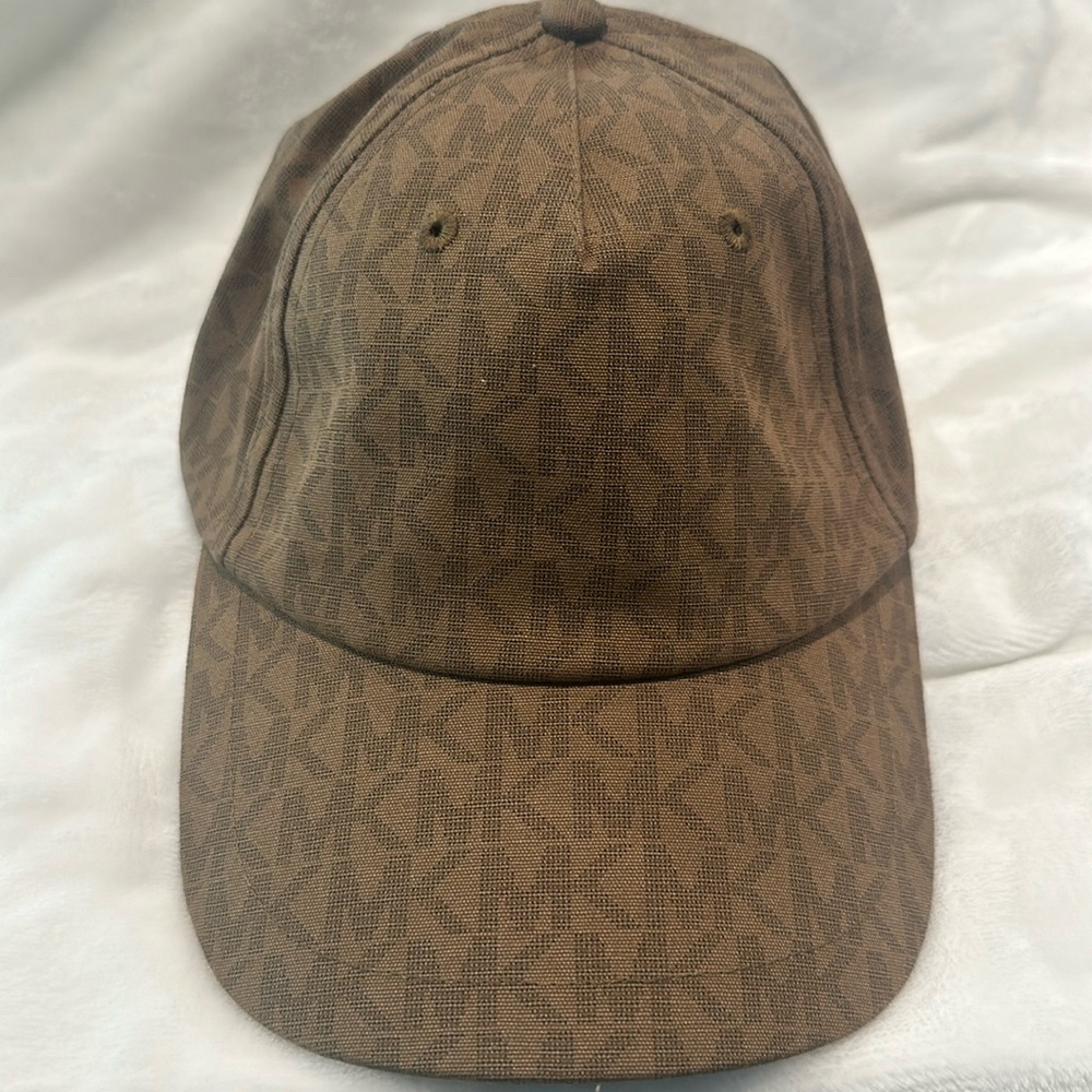 NWT Michael Kors Signature fabric brown cap with adjustable back.